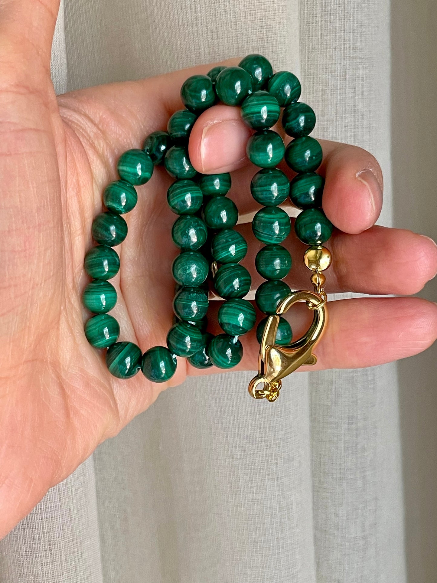 Collana di pietre di malachite